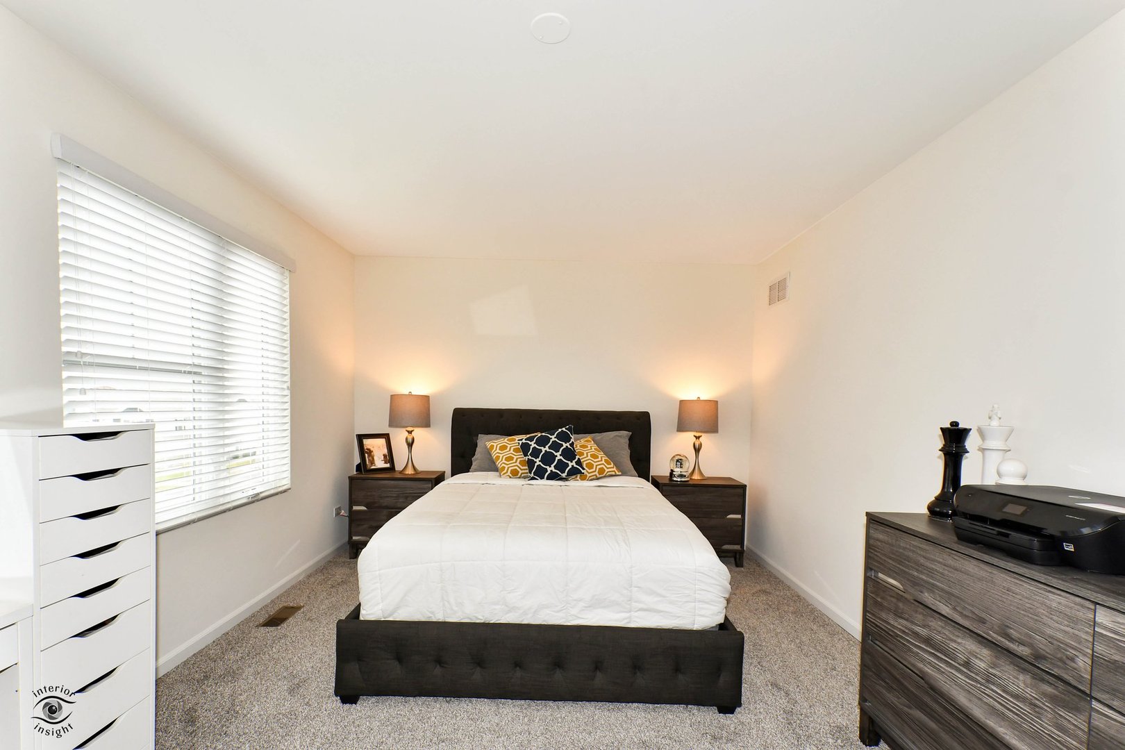 4154 Irving Road Aurora, IL 60504 - Photo 19 of 25 a bedroom with a bed and a window