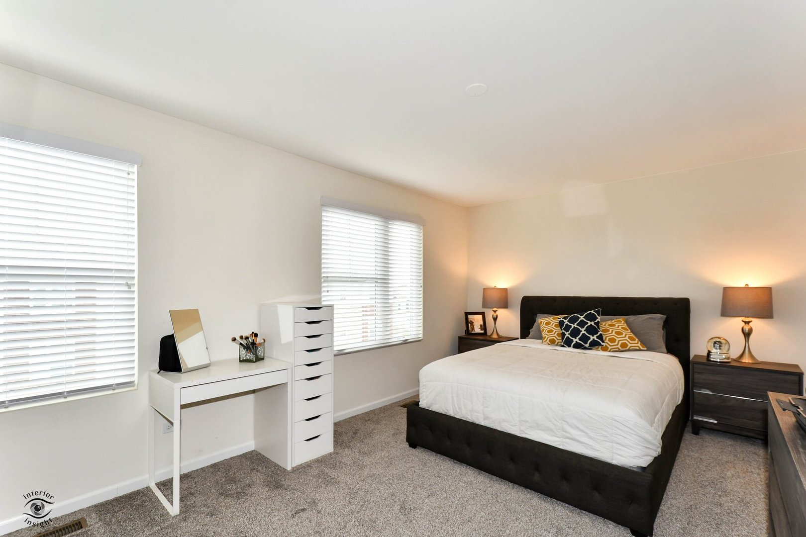 4154 Irving Road Aurora, IL 60504 - Photo 20 of 25 a bedroom with a bed and a desk