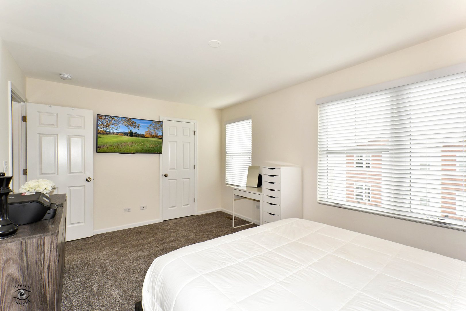 4154 Irving Road Aurora, IL 60504 - Photo 21 of 25 a bedroom with a bed and a large window