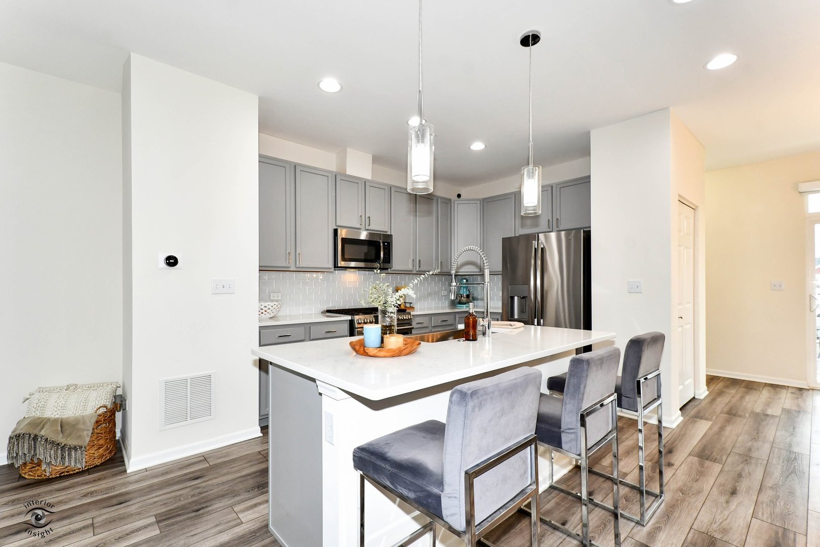 4154 Irving Road Aurora, IL 60504 - Photo 5 of 25 a kitchen with stainless steel appliances a refrigerator sink and microwave