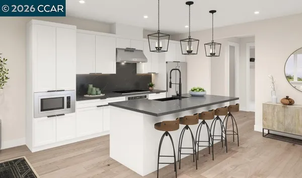 a kitchen with stainless steel appliances granite countertop a sink a stove and a refrigerator