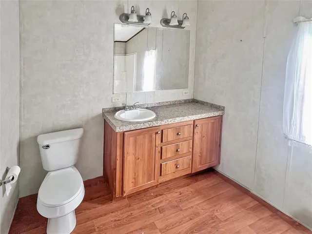 a bathroom with a sink and a toilet