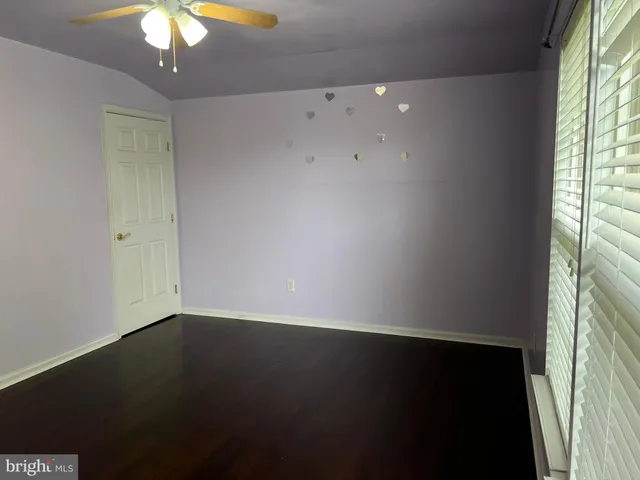 a bathroom with a toilet a sink and shower