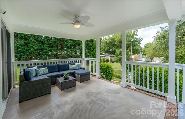 a outdoor living space with furniture and garden view