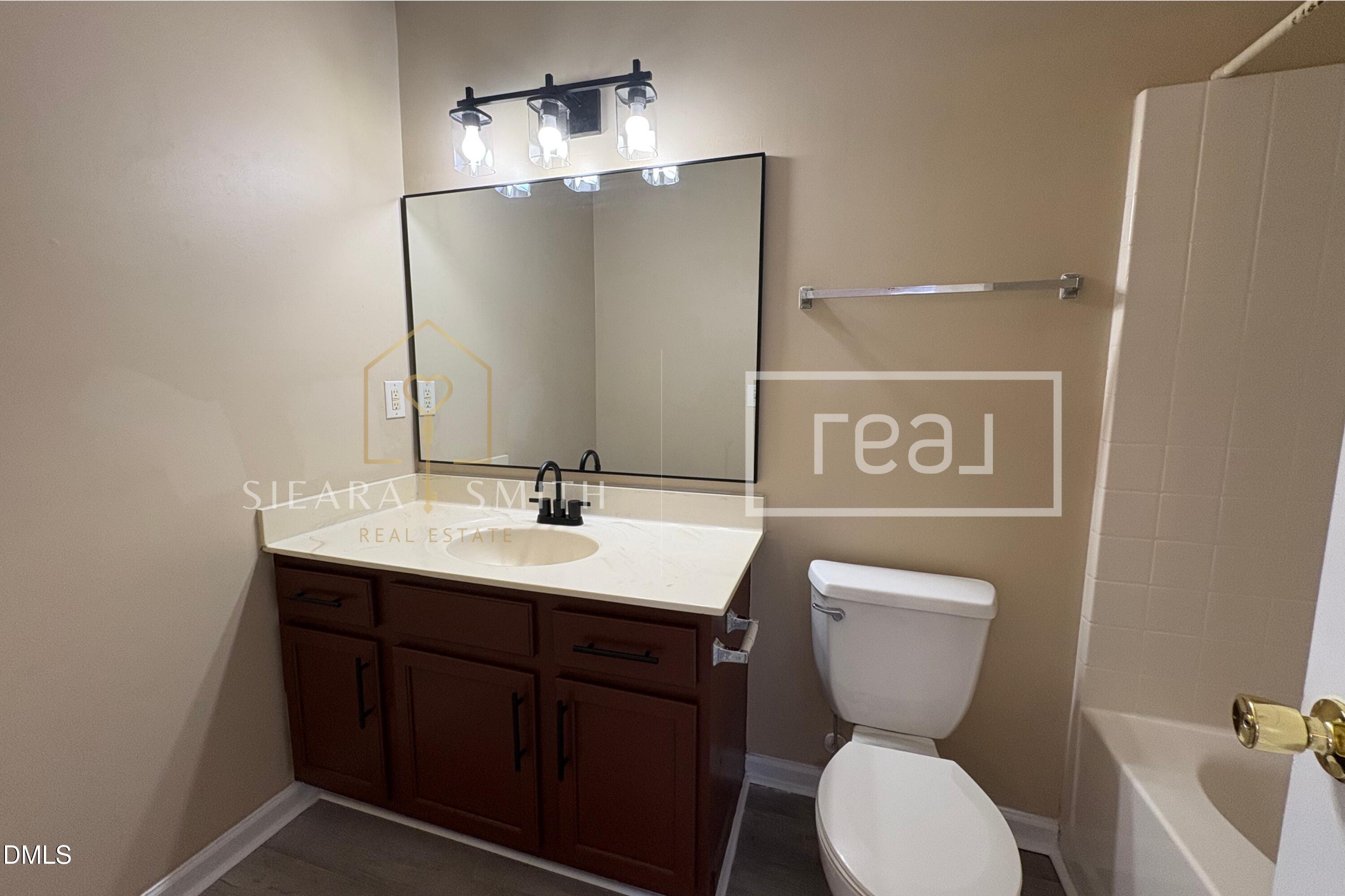 6013 Silkwater Court Raleigh, NC 27610 - Photo 13 of 15 Master Bath