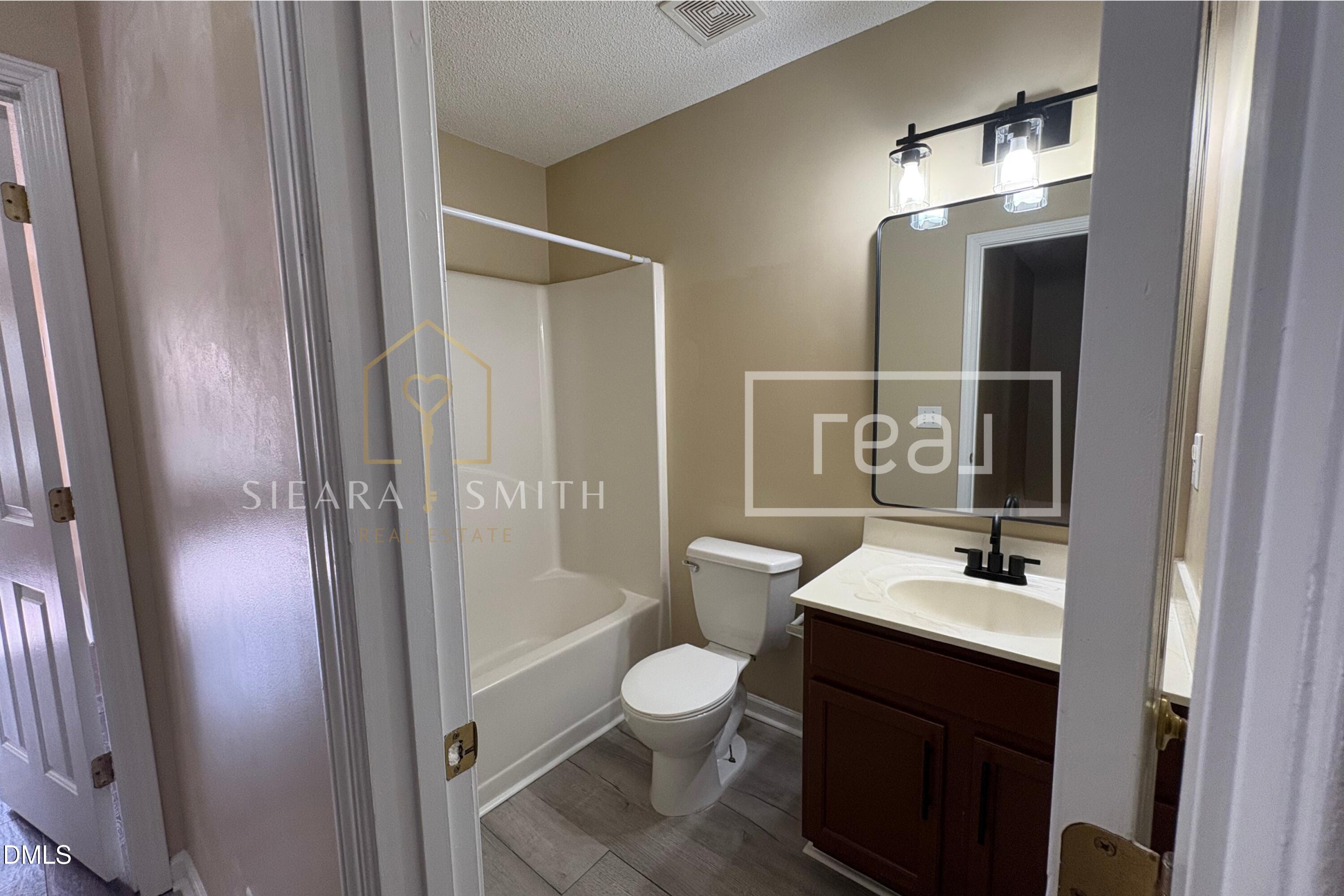 6013 Silkwater Court Raleigh, NC 27610 - Photo 10 of 15 Bathroom 2