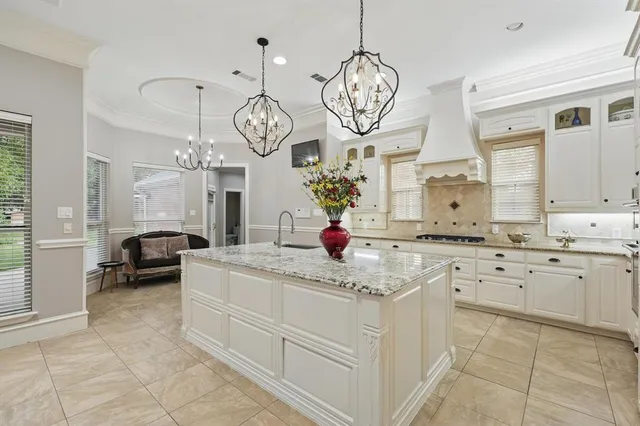 a very nice looking kitchen with a large window appliances