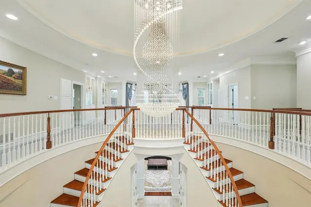 a view of entryway with a front door and wooden floor