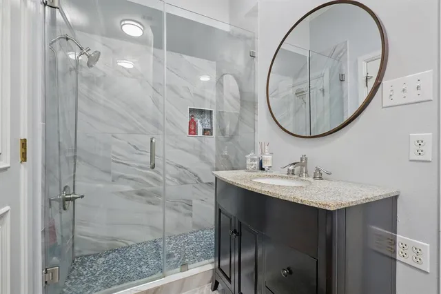 a view of an empty room with a window