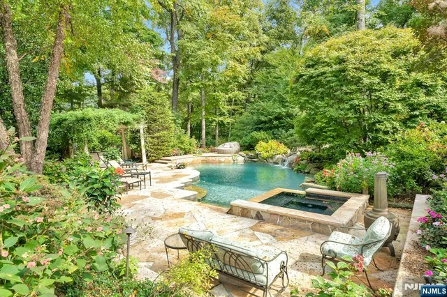 a view of lake from balcony with outdoor seating