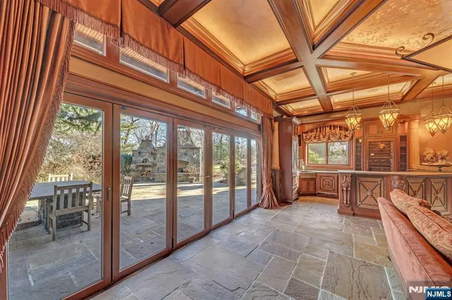 a bathroom with a sink a mirror and a shower