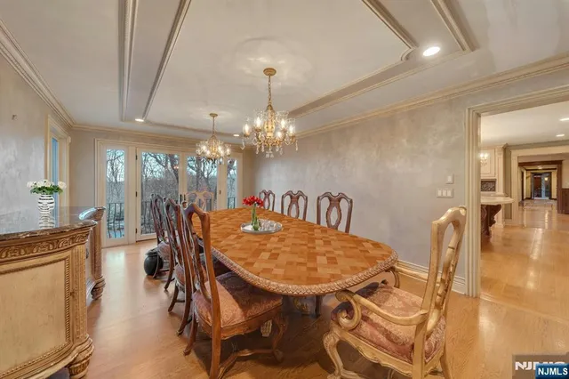 a kitchen with center island table and chairs in it