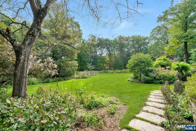 a view of a garden with a fountain