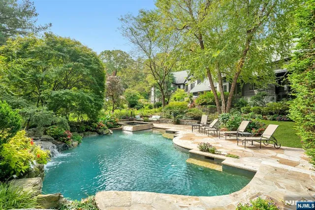 a view of a swimming pool with a sitting space