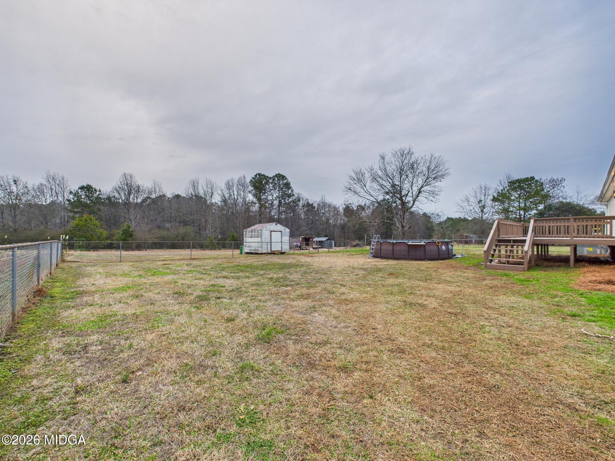 1850 Stallings Road Haddock, GA 31033 - Photo 35 of 44 a view of a house with a yard