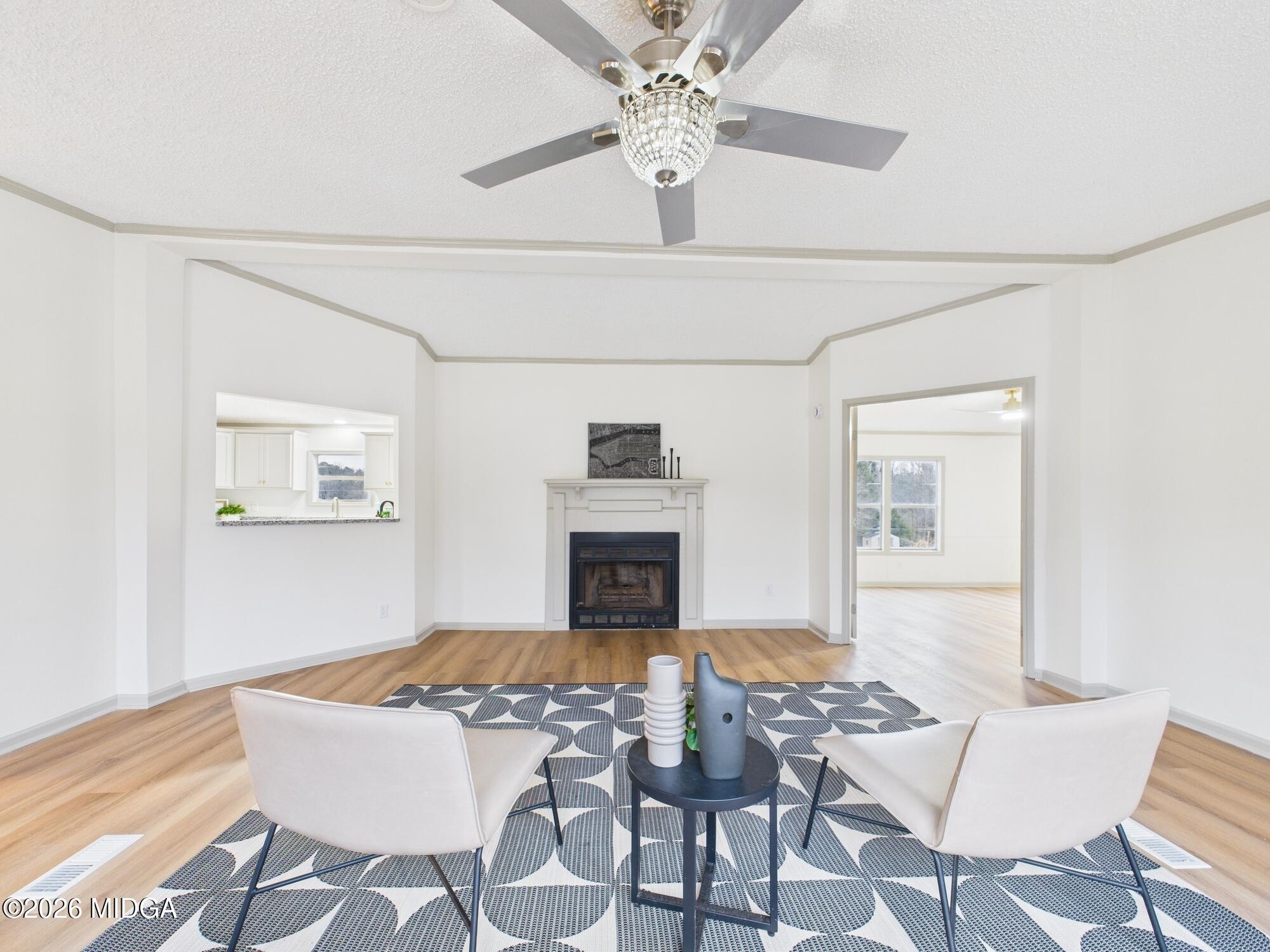 1850 Stallings Road Haddock, GA 31033 - Photo 8 of 44 a view of a livingroom with furniture and fireplace