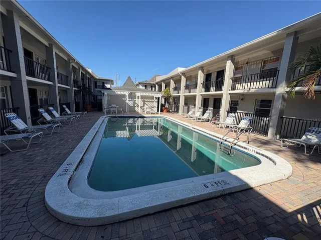 a view of a house with roof deck