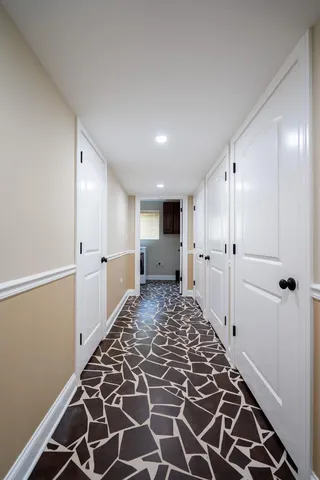 a bathroom with a shower sink and mirror