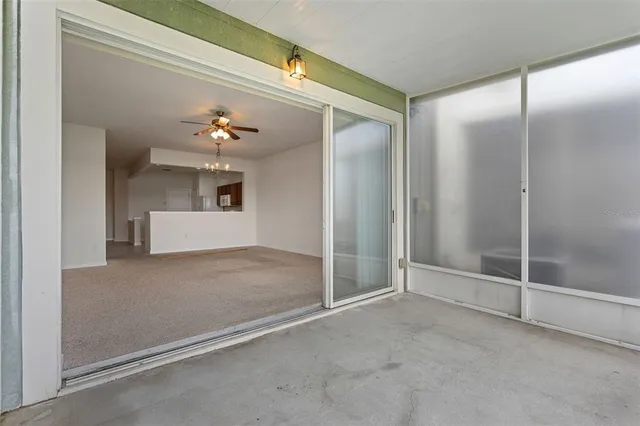 a view of a house with yard and porch