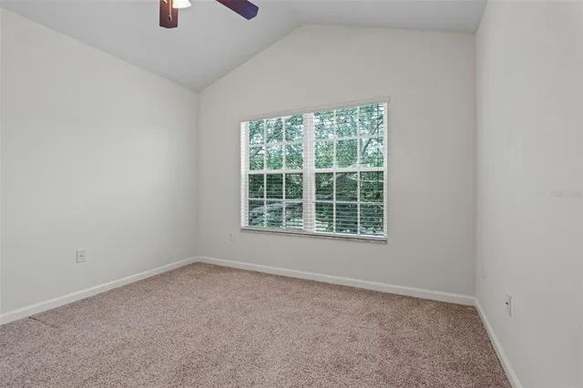 an aerial view of a city with a lake view