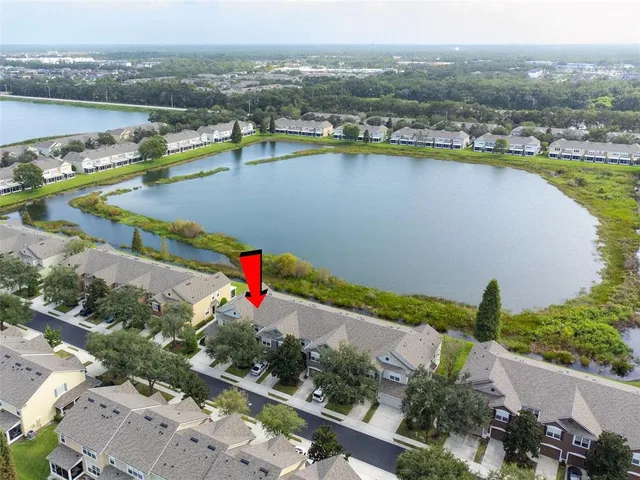 a view of a house with swimming pool