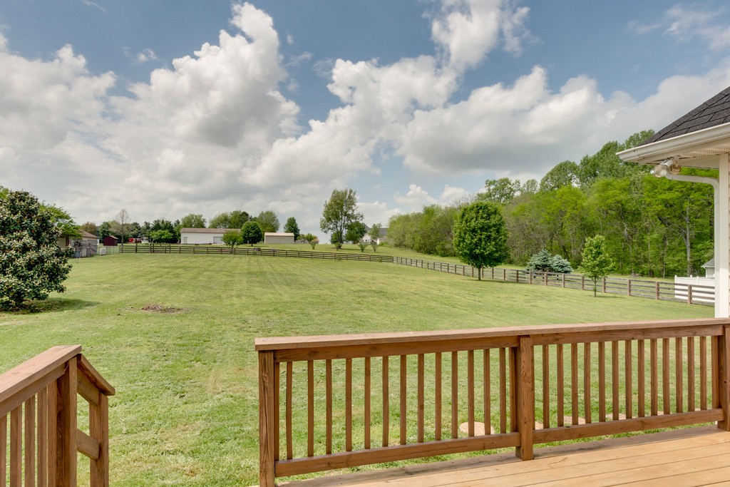 3501 Greens Mill Road Spring Hill, TN 37174 - Photo 14 of 16 a view of deck and lake with trees in the background