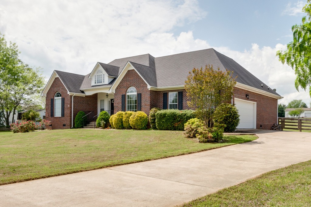 3501 Greens Mill Road Spring Hill, TN 37174 - Photo 2 of 16 a front view of a house with a yard