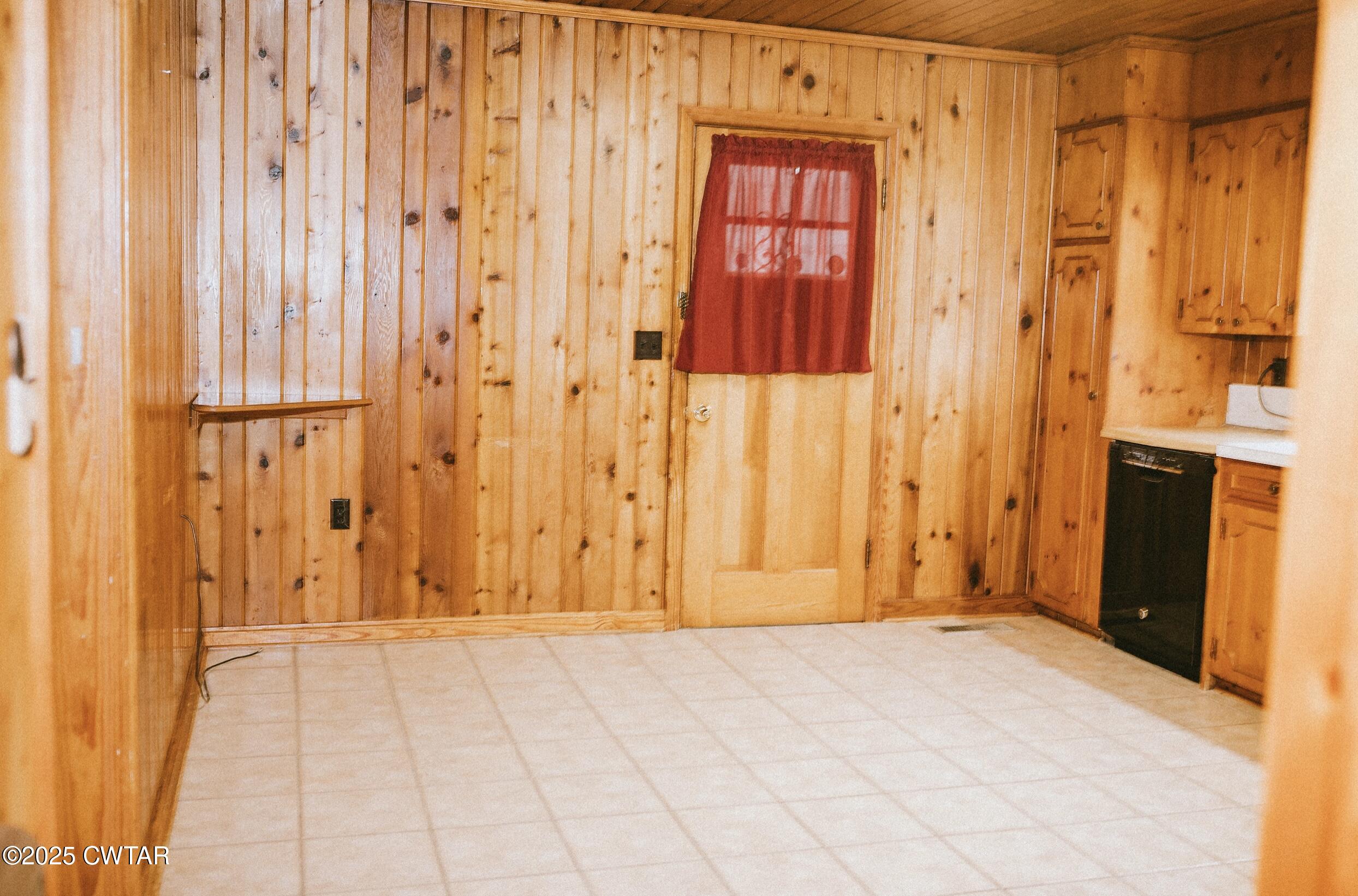 209 Hillside Street Kenton, TN 38233 - Photo 24 of 43 a view of entryway with wooden walls