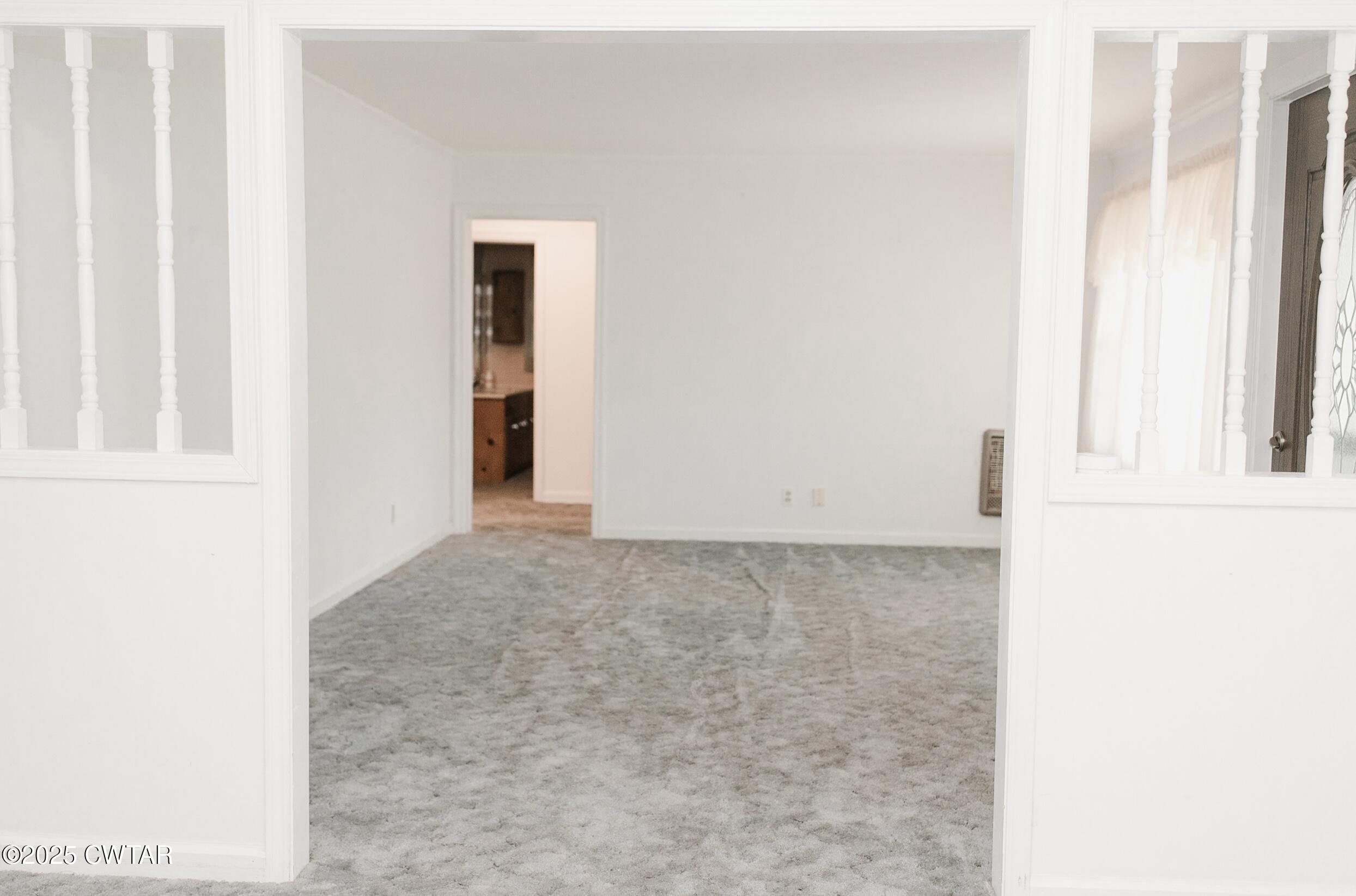 209 Hillside Street Kenton, TN 38233 - Photo 34 of 43 an empty room with windows