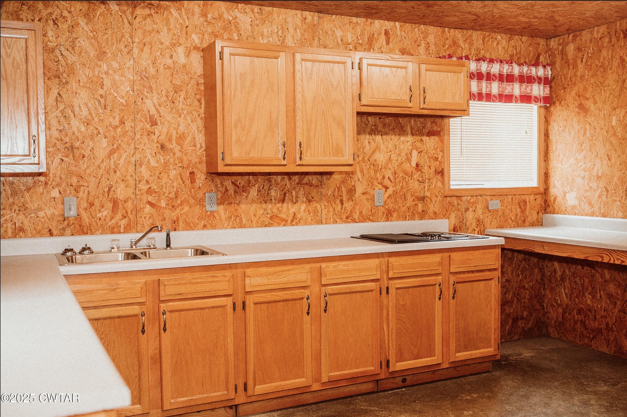209 Hillside Street Kenton, TN 38233 - Photo 10 of 43 a bathroom with a sink and a bathtub