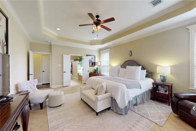 a bed room with a bed and a couch