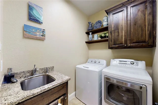 a kitchen with a stove and a sink