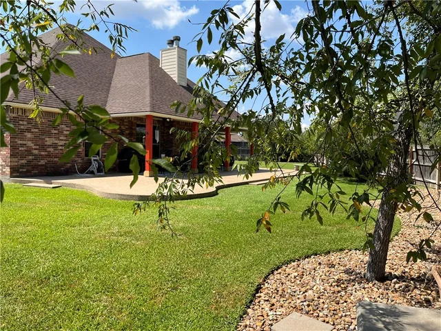 a swimming pool with some trees