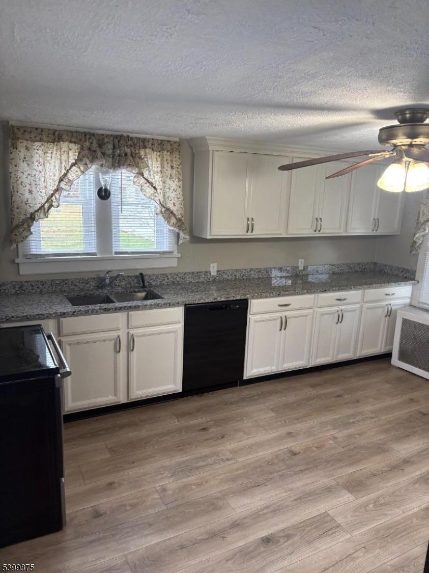 87 Highway 57 Phillipsburg, NJ 08865 - Photo 2 of 5 a kitchen with stainless steel appliances granite countertop a sink and cabinets