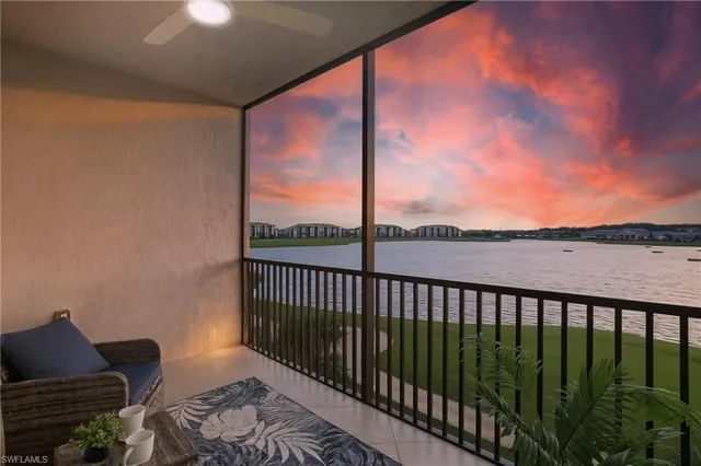 a balcony with furniture and city view