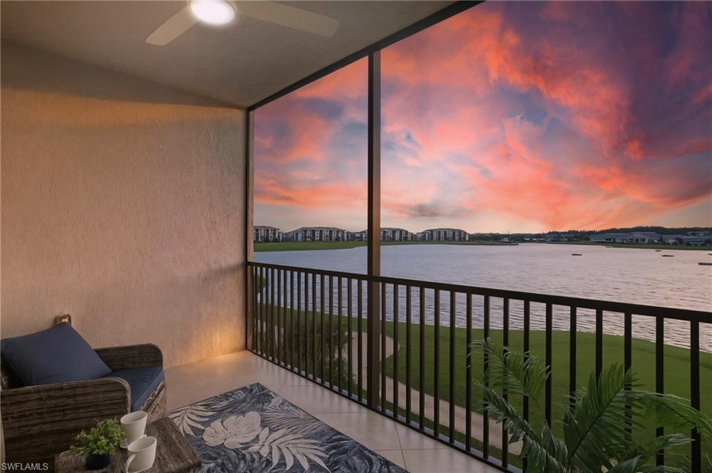 5555 Double Eagle Circle, Unit 3935 Ave Maria, FL 34142 - Photo 1 of 49 a balcony with furniture and city view