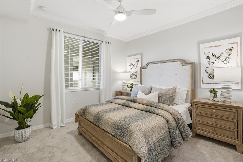 5555 Double Eagle Circle, Unit 3935 Ave Maria, FL 34142 - Photo 22 of 49 a bedroom with a bed and a potted plant