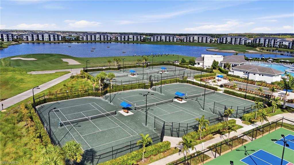 5555 Double Eagle Circle, Unit 3935 Ave Maria, FL 34142 - Photo 43 of 49 a view of a swimming pool with furniture