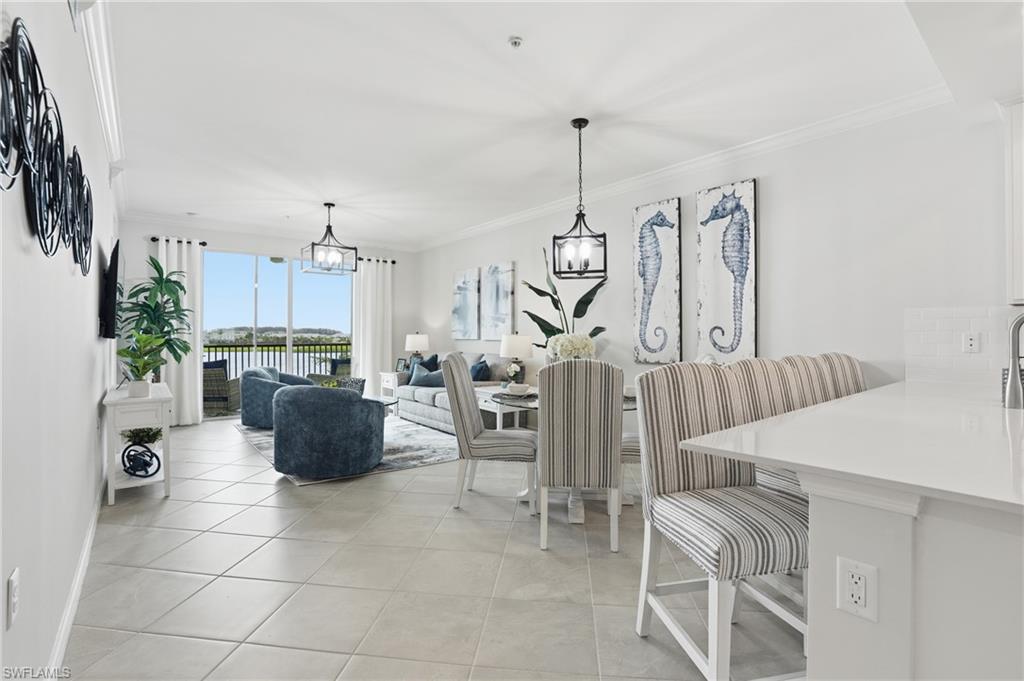 5555 Double Eagle Circle, Unit 3935 Ave Maria, FL 34142 - Photo 6 of 49 a view of kitchen with furniture and wooden floor