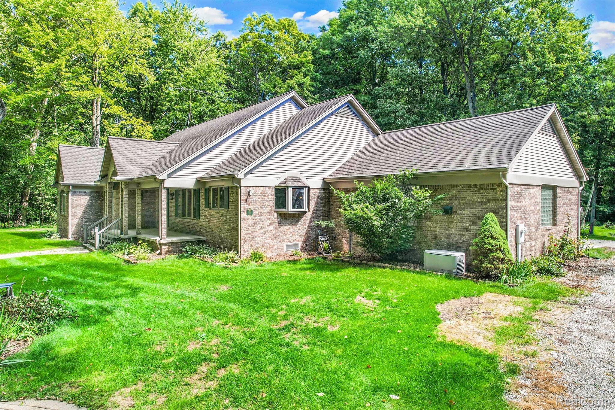 1795 Caughill Road Columbus, MI 48063 - Photo 3 of 38 Surrounded by mature trees