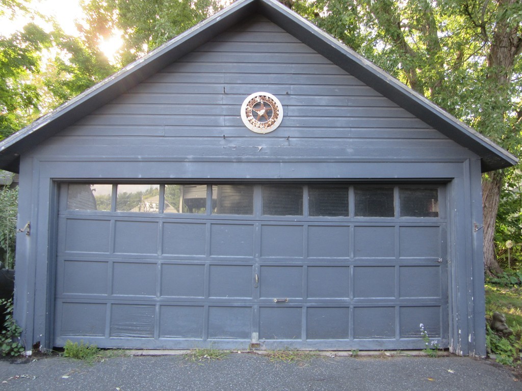 50-52 Dwight Road Springfield, MA 01108 - Photo 6 of 24 a view of brick house and a yard