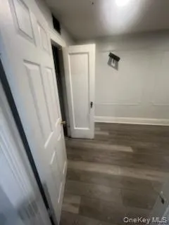 a view of balcony with wooden floor