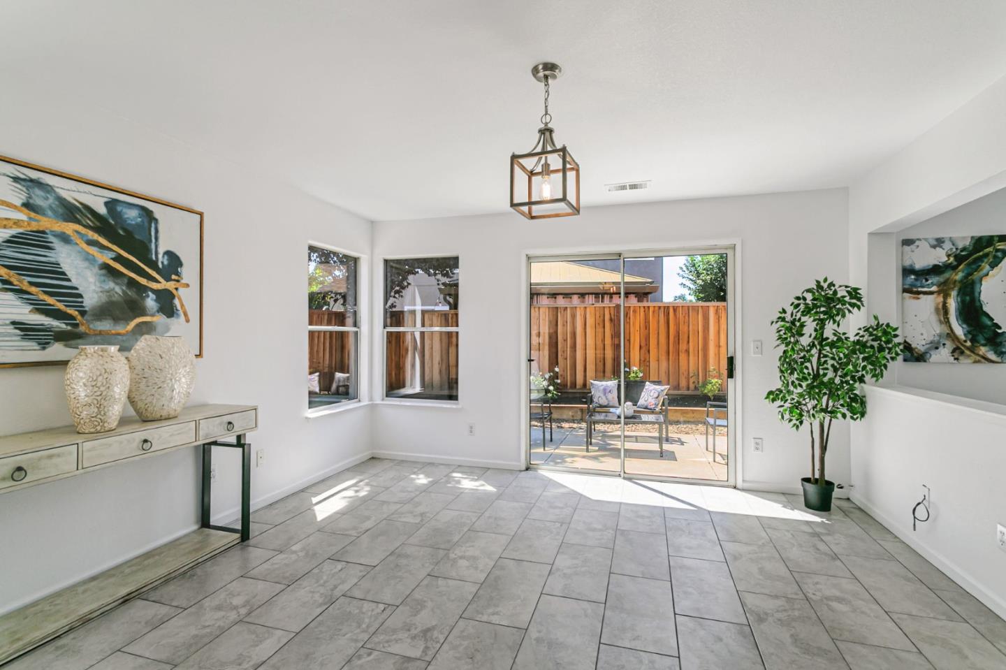 770 Babbs Creek Drive Gilroy, CA 95020 - Photo 13 of 39 a view of a livingroom with furniture and a potted plant