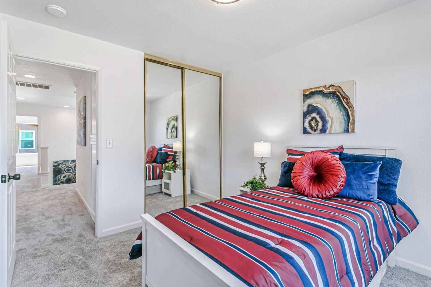 770 Babbs Creek Drive Gilroy, CA 95020 - Photo 22 of 39 a bedroom with a bed and a mirror