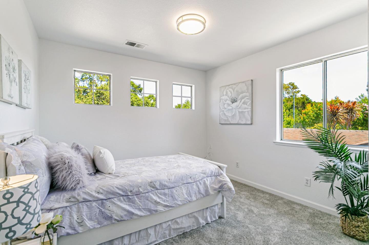 770 Babbs Creek Drive Gilroy, CA 95020 - Photo 23 of 39 a bedroom with a bed and a window