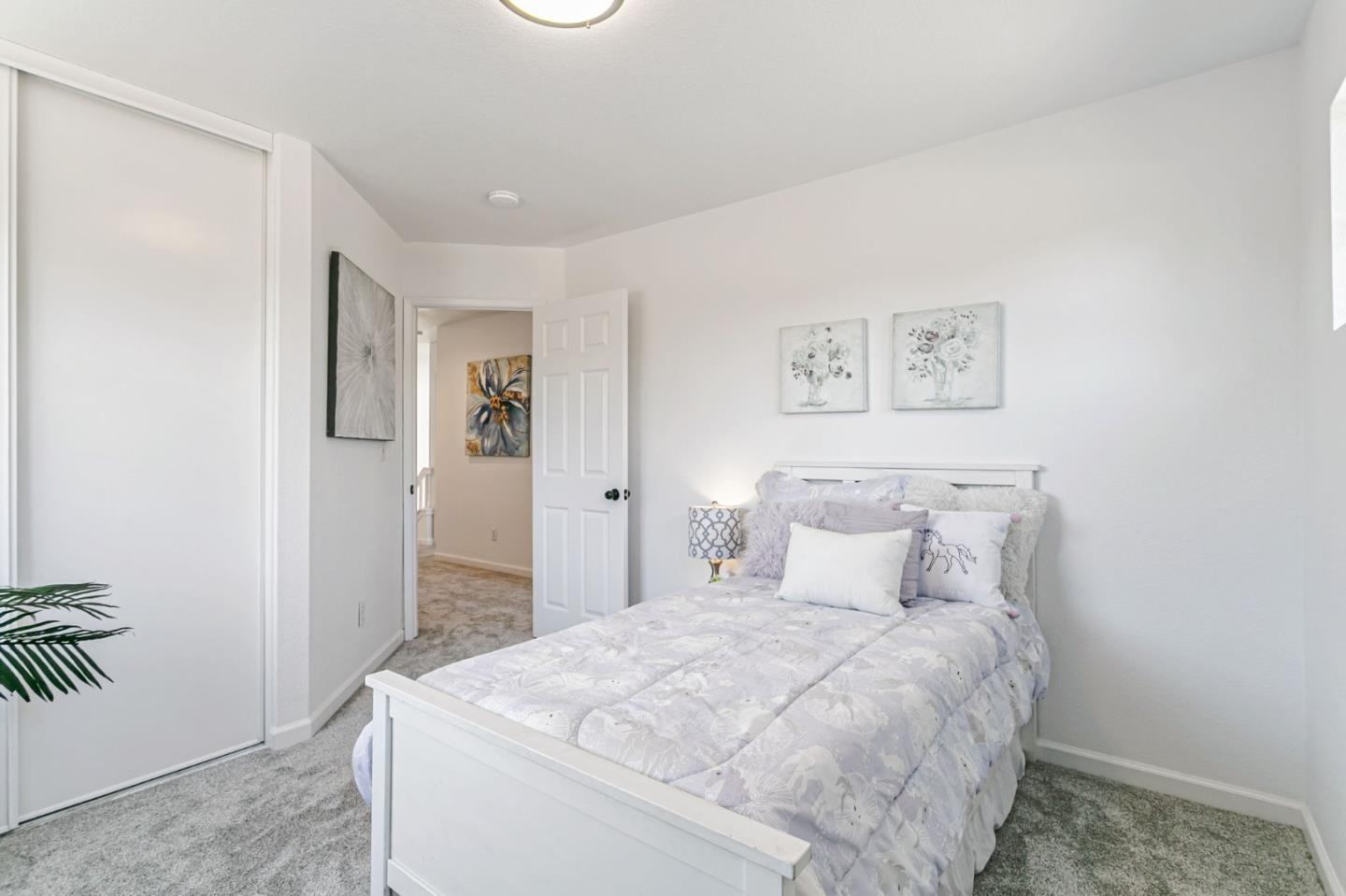 770 Babbs Creek Drive Gilroy, CA 95020 - Photo 24 of 39 a bedroom with a bed and a cabinets