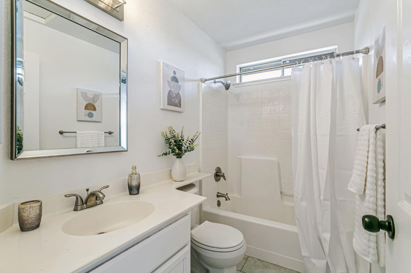 770 Babbs Creek Drive Gilroy, CA 95020 - Photo 31 of 39 a bathroom with a sink toilet and shower