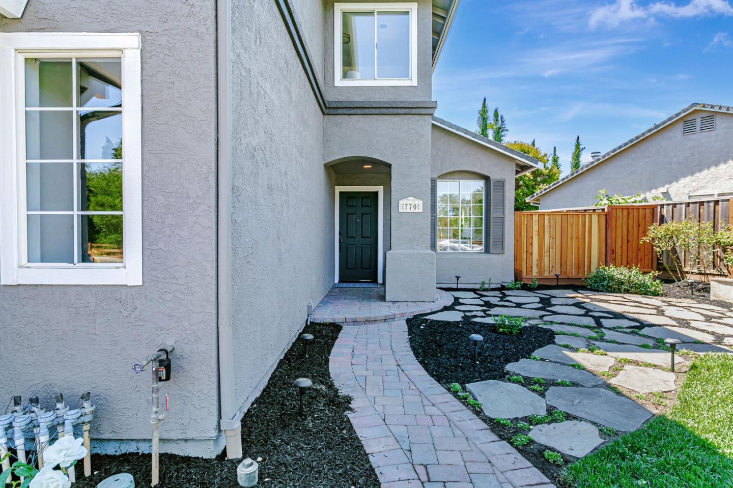 770 Babbs Creek Drive Gilroy, CA 95020 - Photo 4 of 39 a view of a house with backyard and sitting area