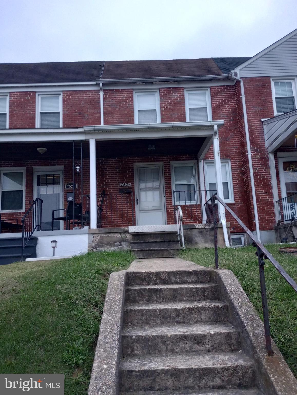 7527 Westfield Road Dundalk, MD 21222 - Photo 3 of 5 a view of a house with a yard balcony and plants
