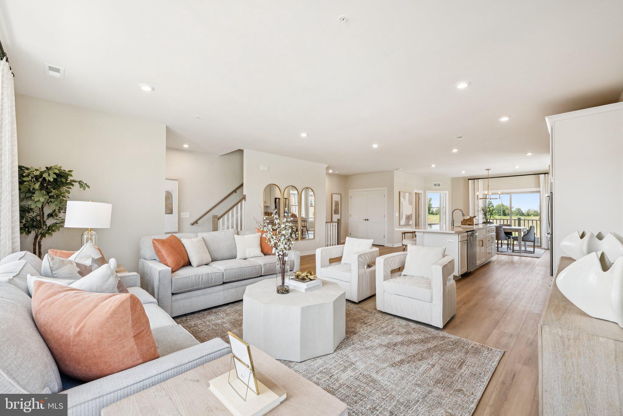8640 Lovelace Street Manassas, VA 20110 - Photo 15 of 32 a living room with furniture and wooden floor